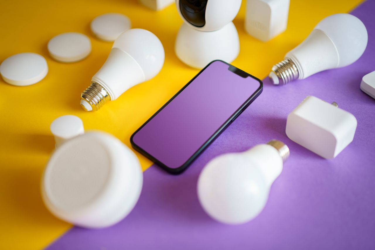 The Art of Drawing Readers In: Your attractive post title goes here Colorful flat lay of smart home devices and smartphone on vibrant background, ideal for technology concepts.